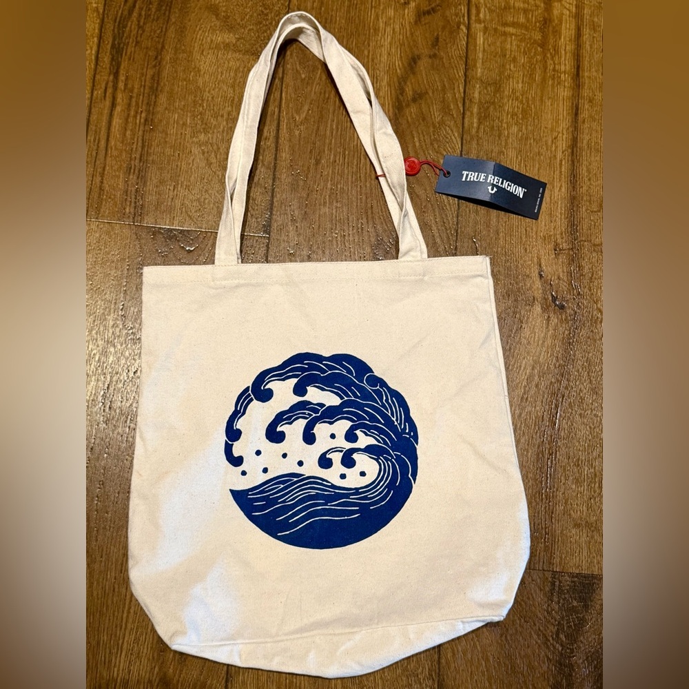True Religion Beige Tote with Navy Wave Design